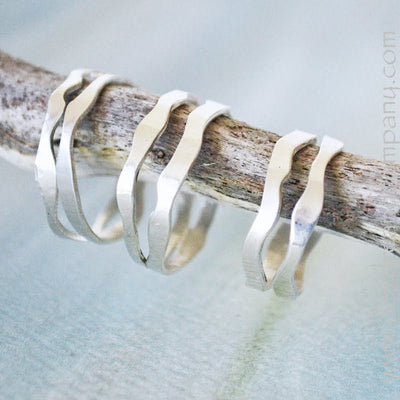 Sterling silver double banded ring, grouping of three rings.