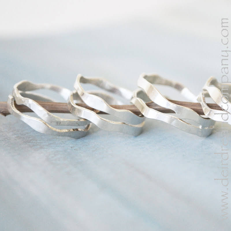 Sterling silver double banded ring, grouping of three rings.