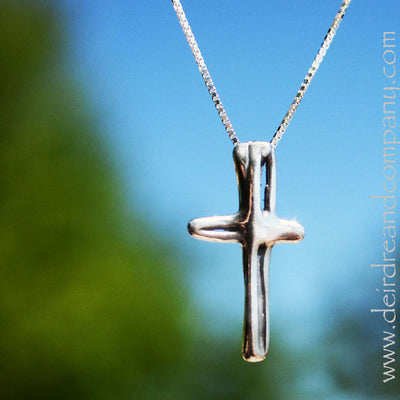 Delicate 1" free-form silver cross necklace