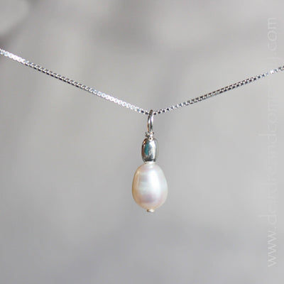 Pearl and sterling drop on sterling box chain.