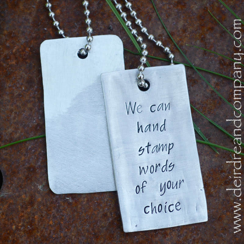 This pewter dog tag on steel bead chain shows an example of the script font, which has capitals and lower case letters