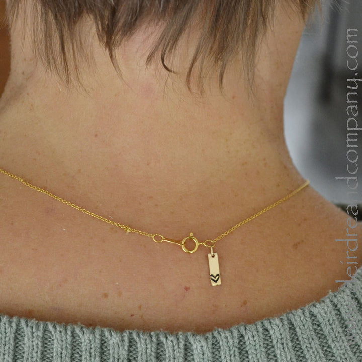 We've Got Your Back Charm in Gold