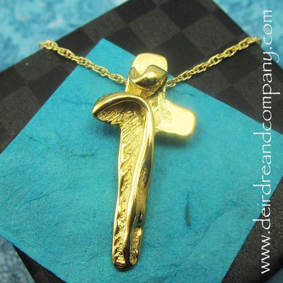 crucifix-gold-necklace-abstract