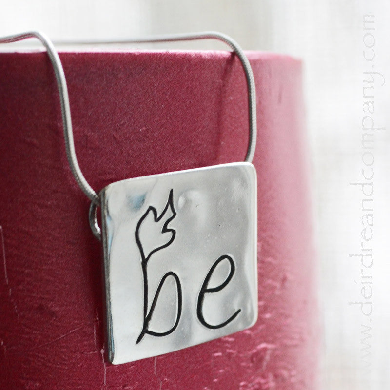 Be Spirit Filled silver square pendant engraved with a dove and the word BE on the front on silver snake chain