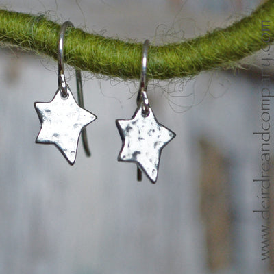 Sterling silver hammered star earrings, 3/8" x 1/4"